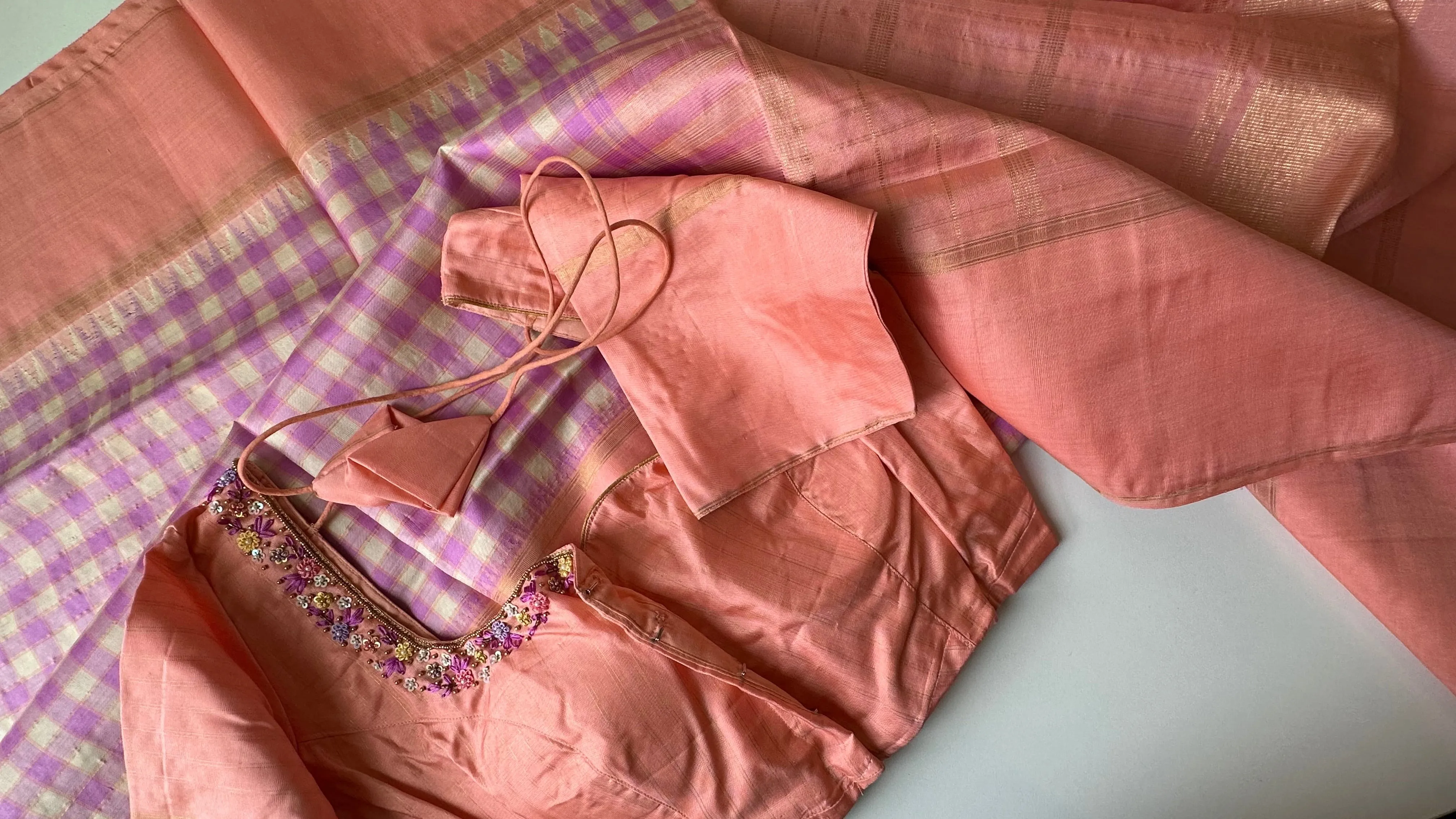 Pastel pure kanjivaram  silk checks saree with hand embroidered blouse
