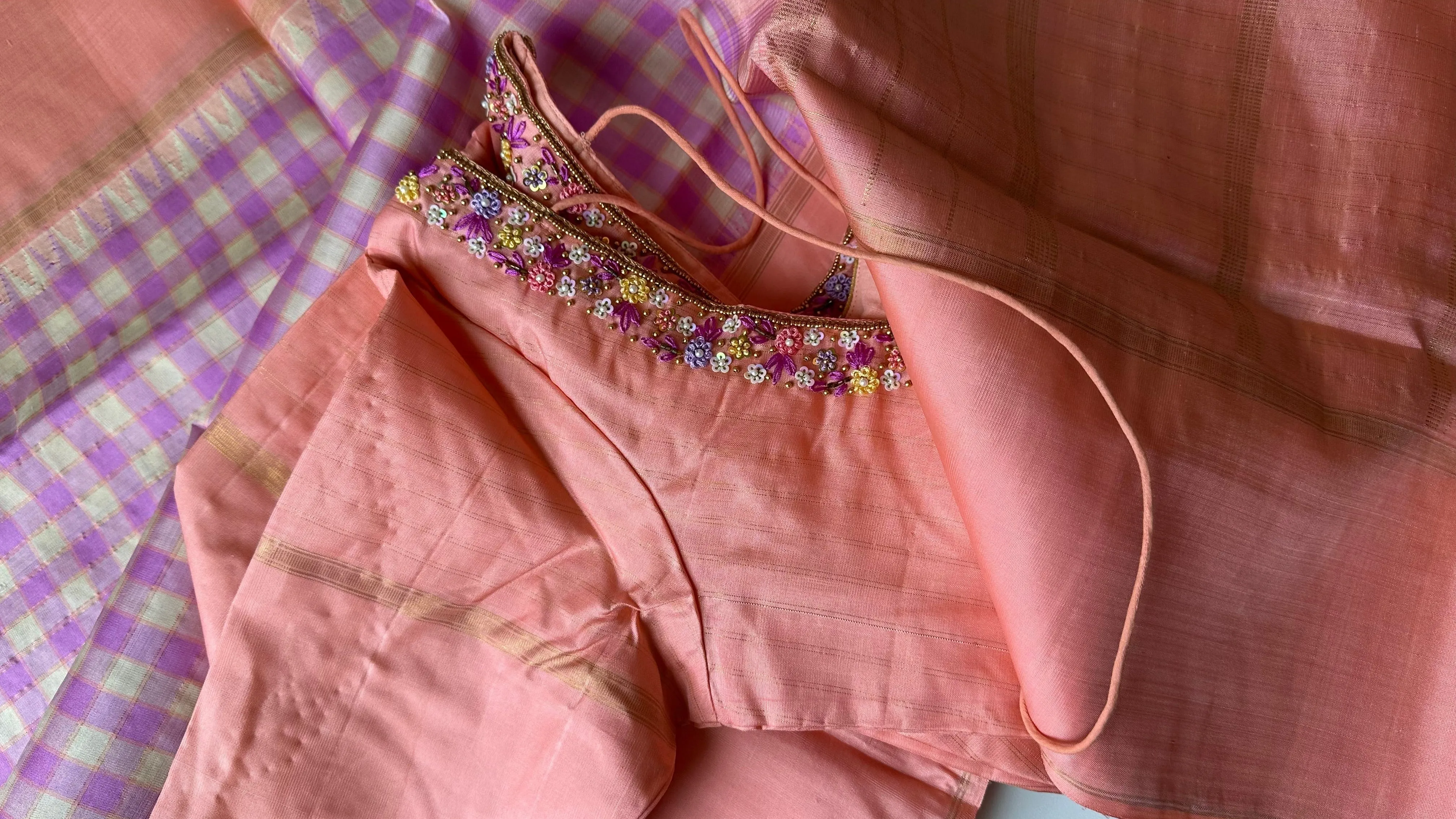 Pastel pure kanjivaram  silk checks saree with hand embroidered blouse