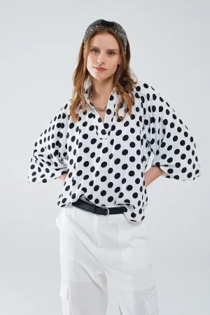 Polka dot blouse with V-neck and balloon sleeves