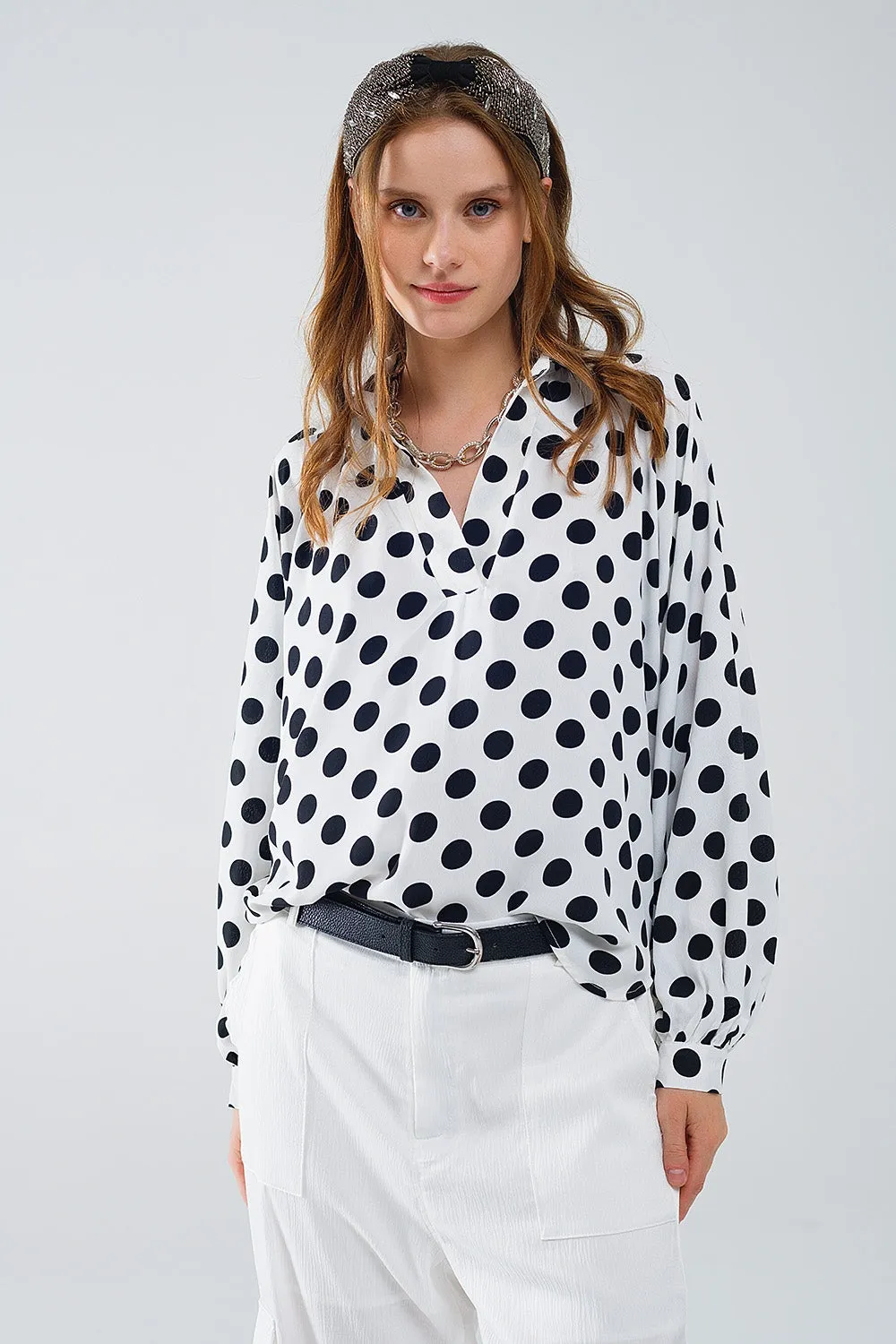 Polka dot blouse with V-neck and balloon sleeves